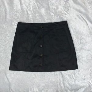 Black button up skirt.